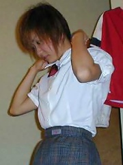 Cute japanese amateur coed in uniform strips and sucks a cock hard